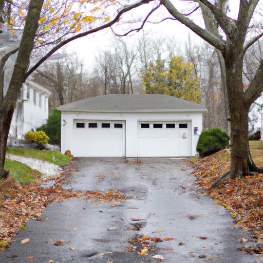 Suburban Chatham home with a clean white sectional garage door on an overcast autumn day